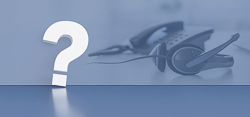 Ein Telefon mit einem Headset und ein Fragezeichen Image Lightbox